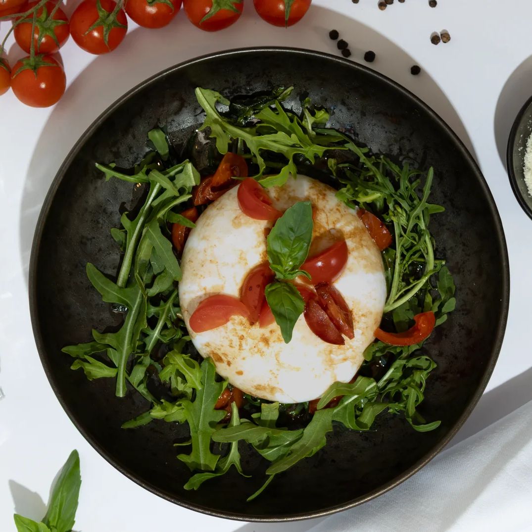 Restaurant isabella burrata mit rucola und tomaten